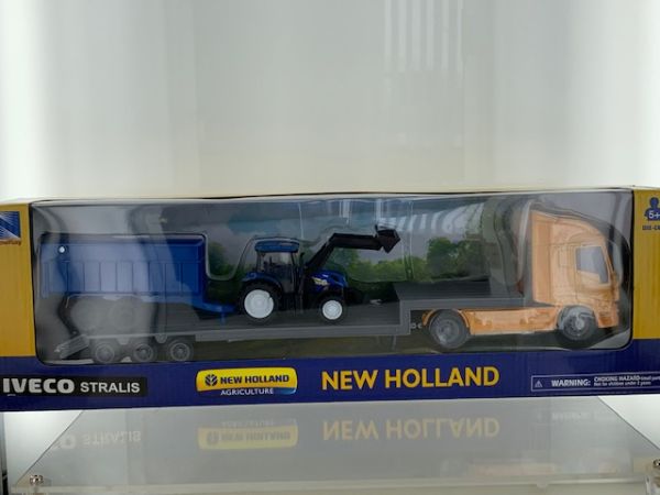 NEW16143B - IVECO Stralis 4x2 con portaequipos y remolque tractor NEW HOLLAND - 1