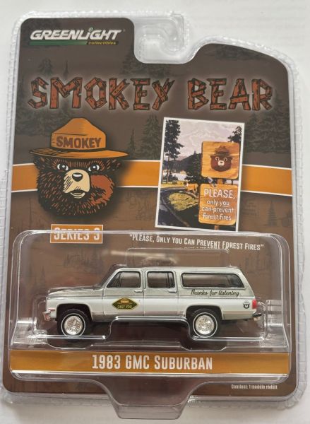 GREEN38060-D_GRIS - 1983 GMC Suburban Gris de la serie SMOKEKEY BEAR en blister - 1